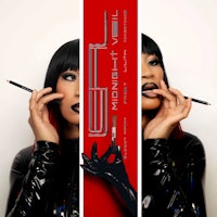 a woman in a black outfit smoking a cigarette